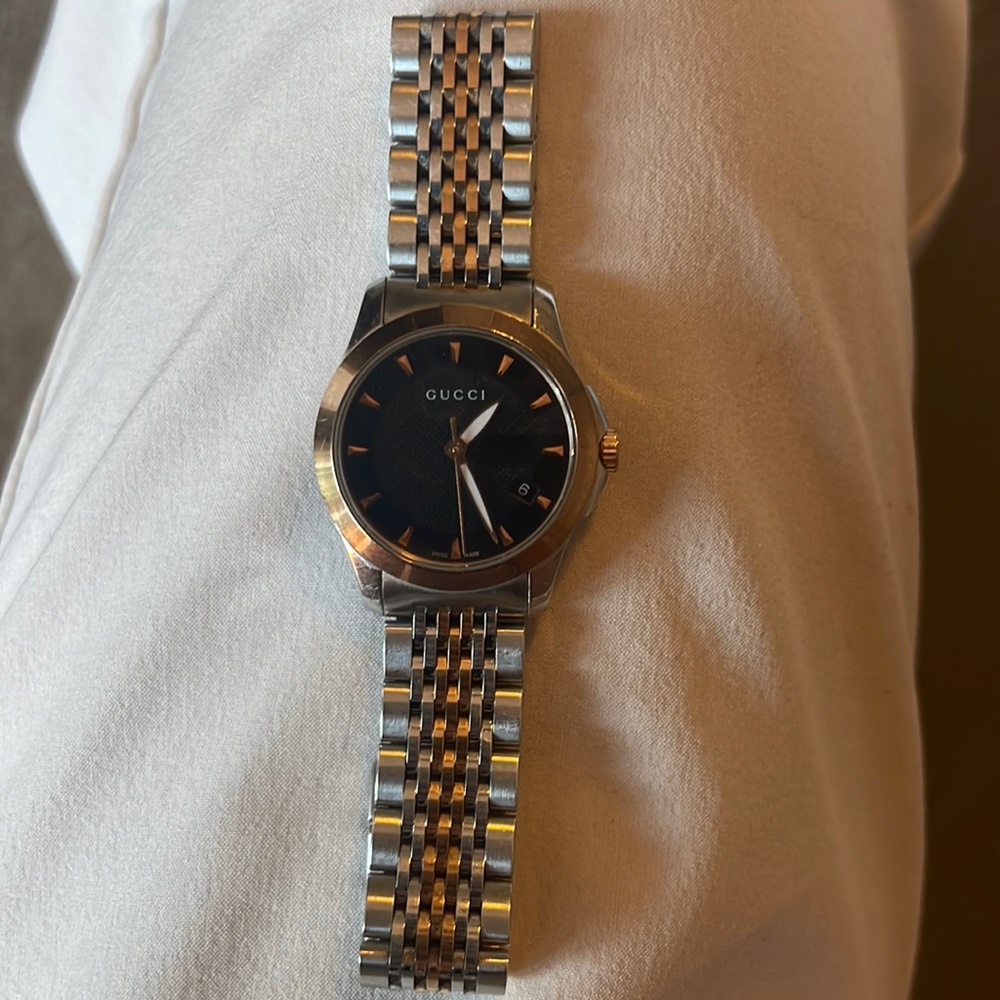 Gold and silver Gucci watch
